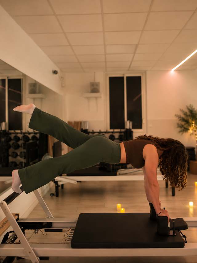 Exercice sur Reformer au studio